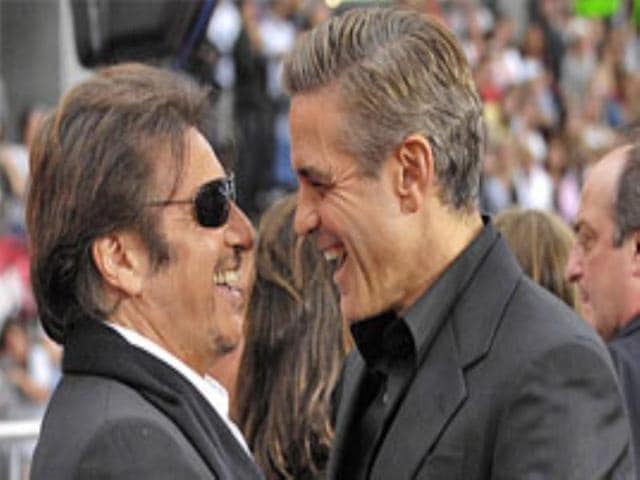 Actors Al Pacino and George Clooney at the premiere of Ocean's thirteen in Hollywood.