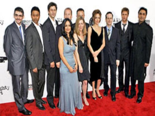 The cast and producers of the film 'A Mighty Heart' pose for a photograph in New York.