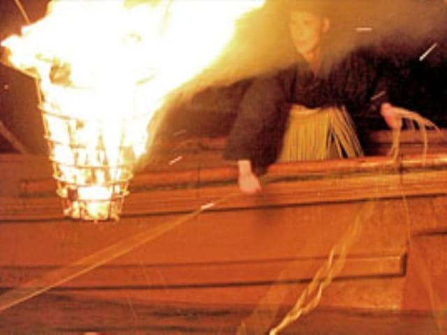 Japanese woman Mariko Sawaki does "Ukai" or traditional Japanese fishing on River Uji in Kyoto.