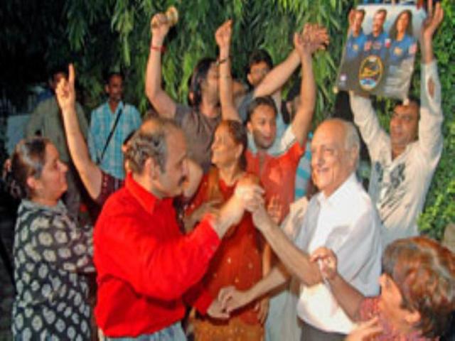 Relatives and well wishers of astronaut Sunita Williams celebrate her safe return to earth.
