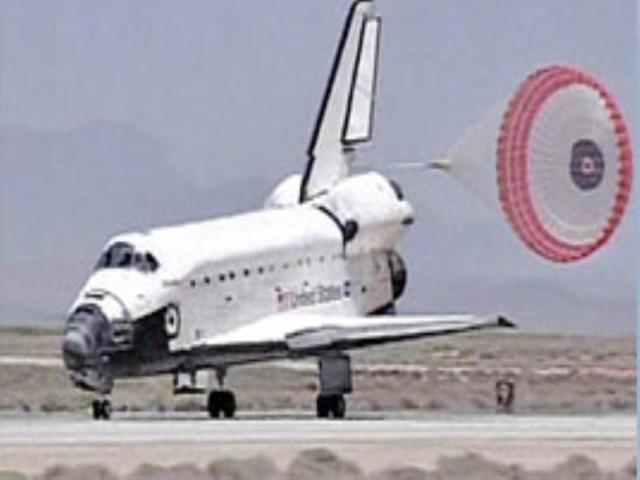 In this image from NASA TV, Space Shuttle Atlantis lands at Edwards Air Force Base, California, Friday, June 22, 2007.