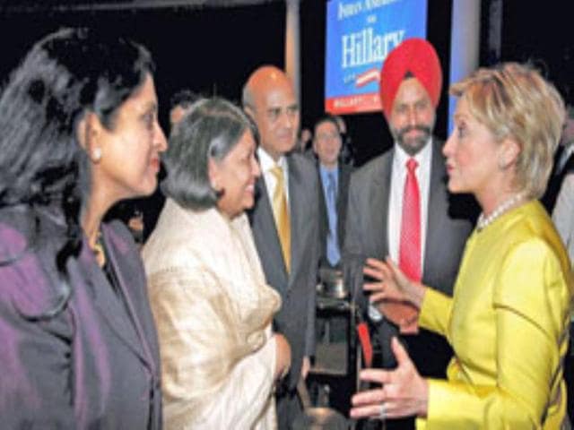Democratic presidential hopeful US Sen. Hillary Clinton chats up Indian Americans at a fund raiser dinner in New York.