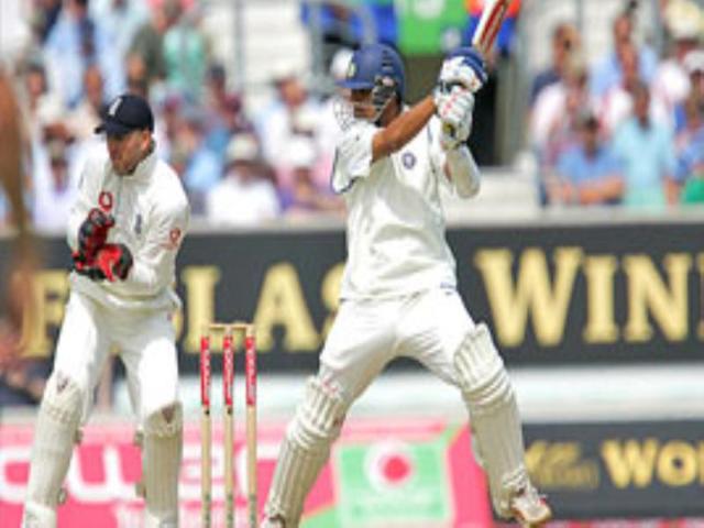 Indian skipper Rahul Dravid hits a shot off England's Monty Panesar.