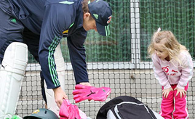 Adam Gilchrist with his daughter Annie during training at the MCG in Melbourne, December 25, 2007.