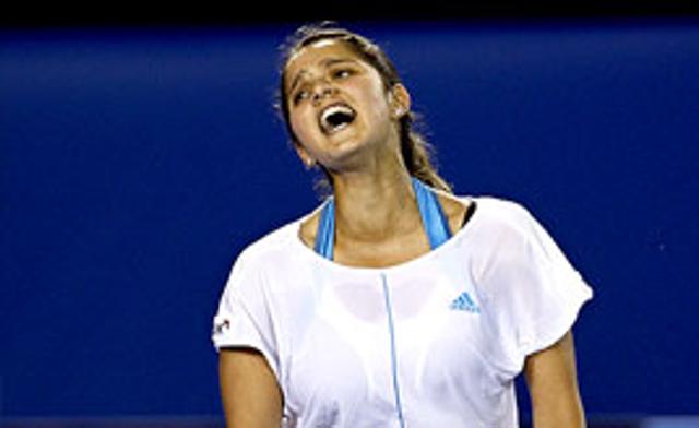 Disgusting: Sania Mirza shouts during her match against Venus Williams of the U.S. at the Australian Open.