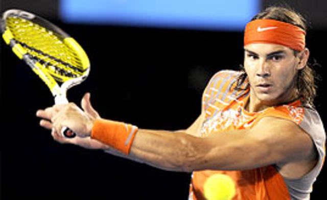 Easy Ride: Rafael Nadal serves against Paul-Henri in his Australian Open match on Sunday.