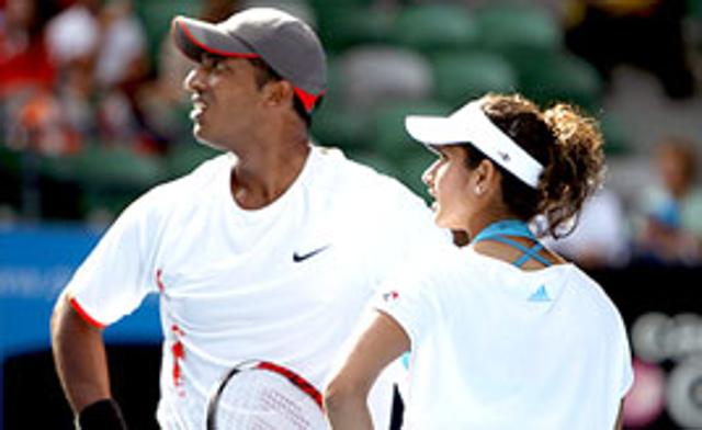 Sania Mirza and Mahesh Bhupathi, react as they play Sun Tiantian and Nenad Zimonjic in their mixed doubles finals match at the Australian Open.