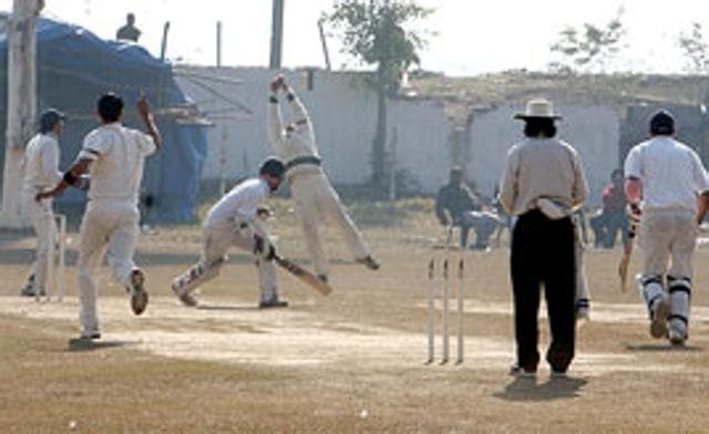 Cricketers at the Science Collage Ground, playing a club match.