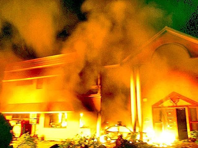 A mob gathered near Vikki's residence and torched it along with eight other houses. (File Photo)