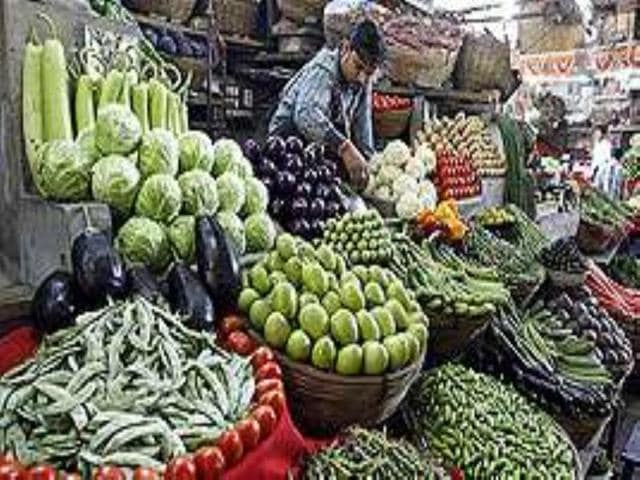 A-vegetable-seller-waits-for-customers-at-a-market-in-Ahmedabad-Higher-food-and-fuel-prices-pushed-up-the-wholesale-price-index-to-6-01-in-May-Reuters-photo