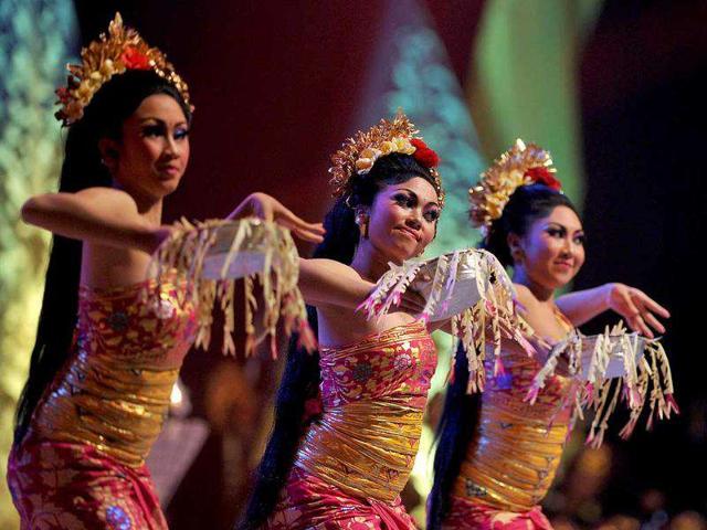 Balinese dancers perform Tari Pendet during the gala diner at the Association of Southeast Asian Nations (ASEAN) foreign ministers meeting in Nusa Dua on Indonesia's resort island of Bali.
