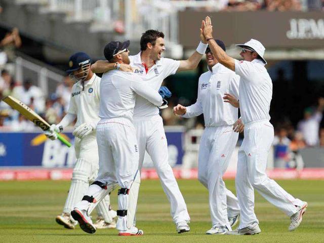 England-s-Graeme-Swann-2nd-R-and-Matt-Prior-R-run-to-celebrate-with-bowler-Stuart-Broad-3rd-L-with-teammates-Alastair-Cook-L-and-Ian-Bell-2nd-L-after-Broad-took-the-last-wicket-of-Ishant-Sharma-to-win-the-match-during-day-five-of-the-1st-Test-match-at-Lord-s-in-London