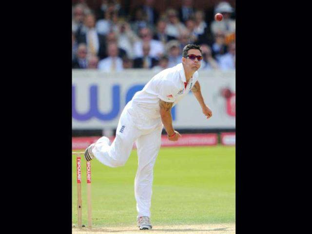 England's Kevin Pietersen bowls a ball to Mahendra Singh Dhoni during the fifth day of the first Test match at Lord's in London.