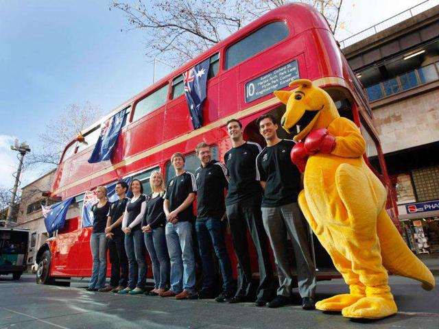 Australian 2012 Olympic team hopefuls pose with a boxing kangaroo in front of a London bus at a media event in Sydney. The event signalled the one year to go countdown to the London Olympics.