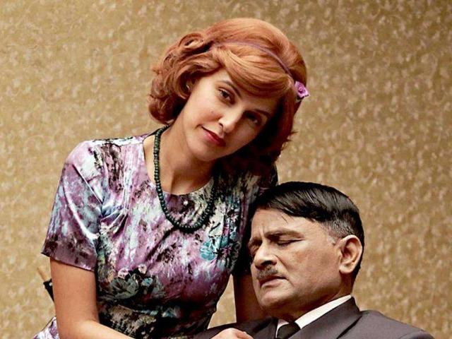 Neha-Dhupia-and-Raghuveer-Yadav-in-a-still-from-Gandhi-To-Hitler Neha-Dhupia-and-Raghuveer-Yadav-in-a-still-from-Gandhi-To-Hitler