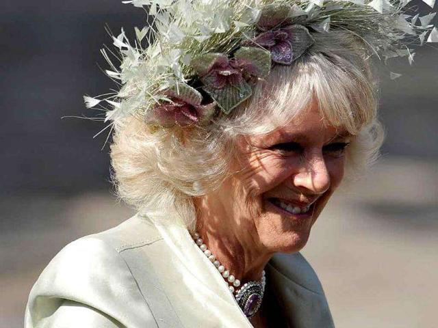 Camilla, Duchess of Cornwall, arrives for the marriage of Britain's Zara Phillips, the eldest granddaughter of Queen Elizabeth, and England rugby captain Mike Tindall, at Canongate Kirk in Edinburgh, Scotland.