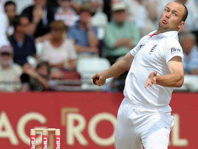 England's Jonathan Trott bowls during the second day of the second cricket Test match at Trent Bridge in Nottingham, central England.