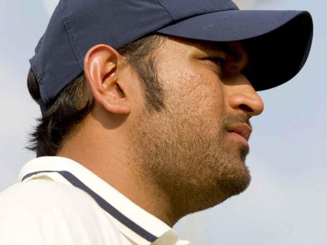 MS-Dhoni-is-framed-by-a-rig-of-floodlights-after-his-team-s-319-run-loss-to-England-on-the-fourth-day-of-their-cricket-Test-match-at-Trent-Bridge-cricket-ground-Nottingham