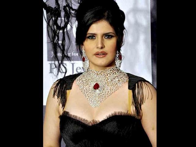 Zarine Khan, who walked the ramp for Johara Jewels, presented a very boring creation.
