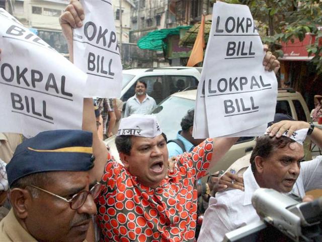 Supporters of social activist Anna Hazare shout slogans during a protest against the government's version of the lokpal bill in Mumbai.