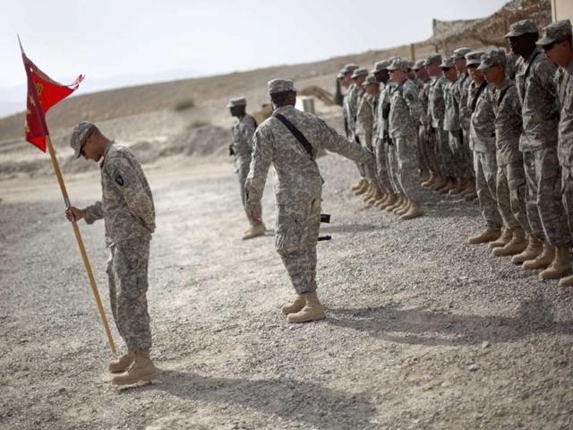 Soldiers with the US Army's 4th Brigade Combat Team line up following a transfer of authority ceremony at Forward Operating Base Sharana in Paktika province, Afghanistan.