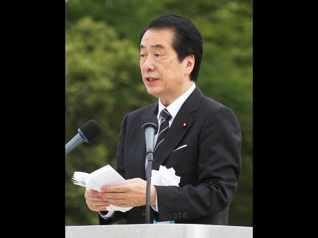 Japanese Prime Minister Naoto Kan delivers a speech during the service to commemorate the 1945 atomic bombing of Hiroshima at the Hiroshima Peace Memorial Park. Japan marks the 66th anniversary of US atomic bombing of Hiroshima as the country struggles to end a crisis at a nuclear power plant ravaged by the March quake-tsunami disaster.