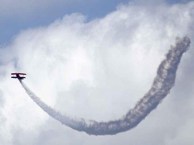 Team Oracle's Sean D Tucker performs in the Seafair Air Show in Seattle.