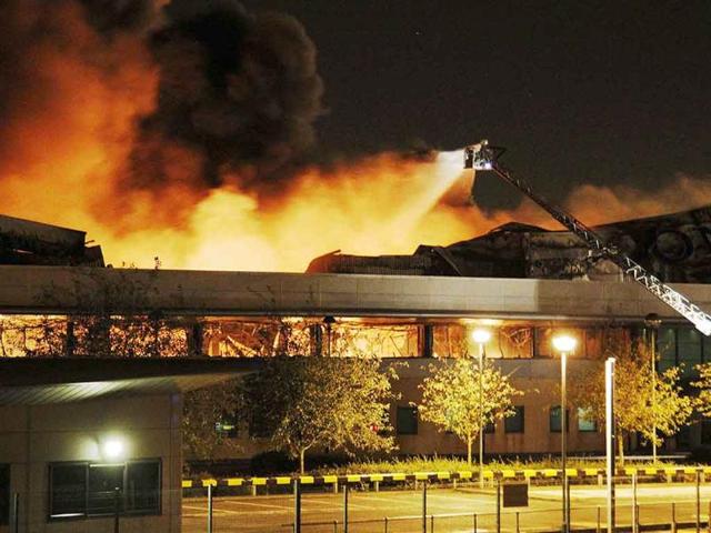 Fire destroys a Sony warehouse in Enfield in north London.