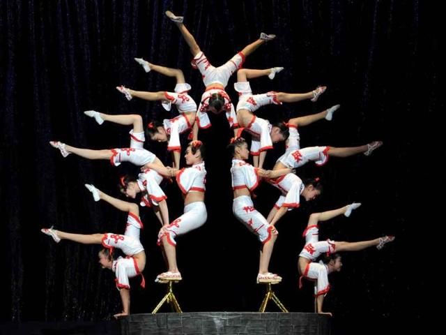 Members of the Chinese Circus perform during the inauguration of the 10th International Festival of Summer Circus "CIRCUBA" at Karl Marx theater in Havana.