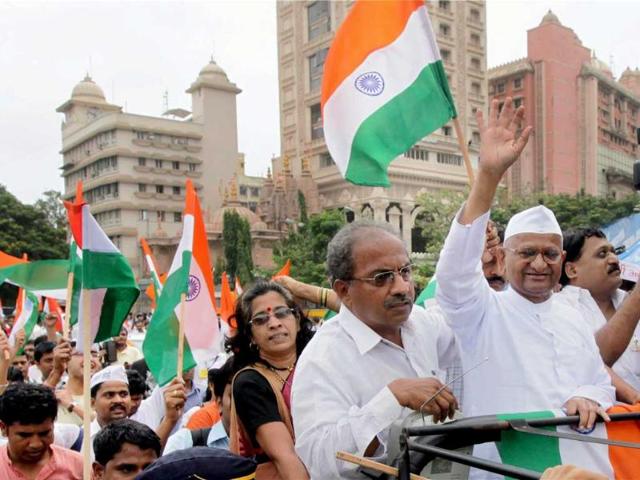 Social-activist-Anna-Hazare-waves-the-national-flag-at-Ramlila-grounds-in-New-Delhi-A-vast-and-jubilant-crowd-cheered-as-Gandhian-activist-Hazare-walked-out-of-jail-in-New-Delhi Social-activist-Anna-Hazare-waves-the-national-flag-at-Ramlila-grounds-in-New-Delhi-A-vast-and-jubilant-crowd-cheered-as-Gandhian-activist-Hazare-walked-out-of-jail-in-New-Delhi
