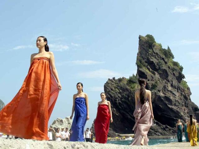 South Korean models in traditional outfits pose during a fashion show on Ulleung island. The show aimed to promote the country's sovereinty on nearby islets of Dokdo claimed both by Seoul and Tokyo.