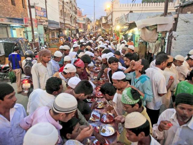 Afghan-children-stand-in-a-queue-as-they-receive-food-distributed-on-the-first-day-of-holy-month-of-Ramadan-outside-a-mosque-in-the-poor-neighborhood-of-Kabul-Afghanistan Afghan-children-stand-in-a-queue-as-they-receive-food-distributed-on-the-first-day-of-holy-month-of-Ramadan-outside-a-mosque-in-the-poor-neighborhood-of-Kabul-Afghanistan