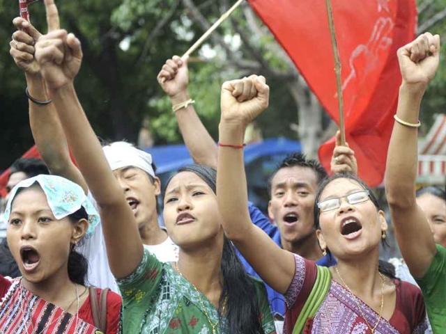 Activists from Karbi Students’ Association (KSA) shout anti-government slogans during a protest against alleged corruption by the ruling government in New Delhi. Hundreds of students and youths the hill districts of Assam state held a protest march to demand an autonomous state and against corruption.