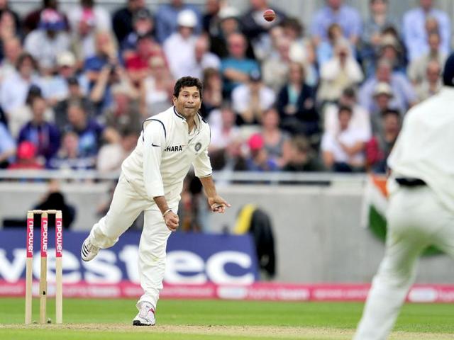 Sachin Tendulkar bowls during the third day of the third Test against England at the Edgbaston cricket ground in Birmingham.