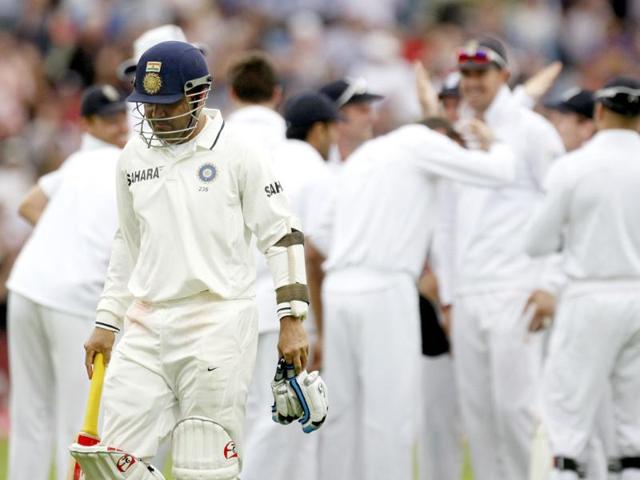 Virender Sehwag, left, walks off after being dismissed without scoring on the third day of the third Test match against England at the Edgbaston Cricket Ground, Birmingham.