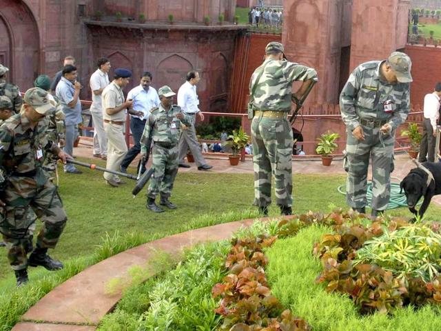 Indian army soldiers check around the Red Fort before a full dress rehearsal for Independence Day celebrations in New Delhi.