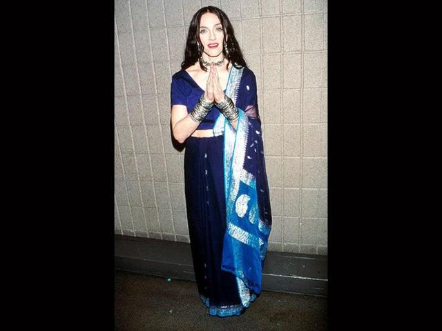 Known to be obssessed with Indian clothes when she was young, Madonna couldn't stay away from the saree either.