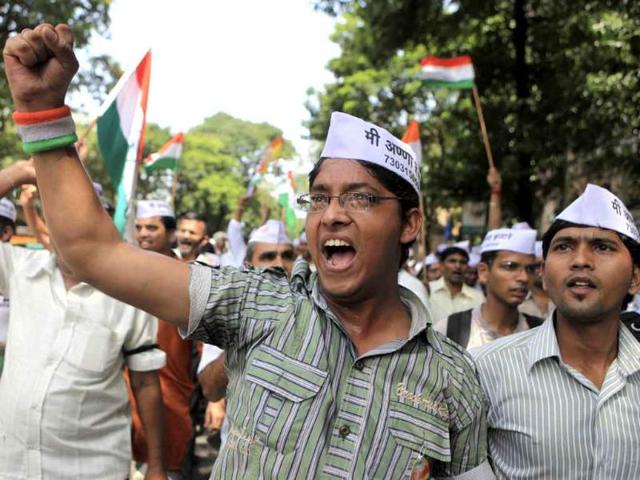Supporters of rights activist Anna Hazare shout slogans during a rally in Mumbai.