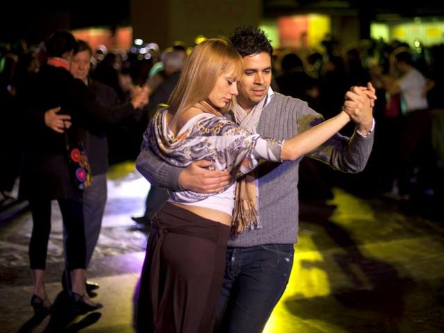 Couples dance during the inaugural night of the 2011 Tango World Championship in Buenos Aires, Argentina.
