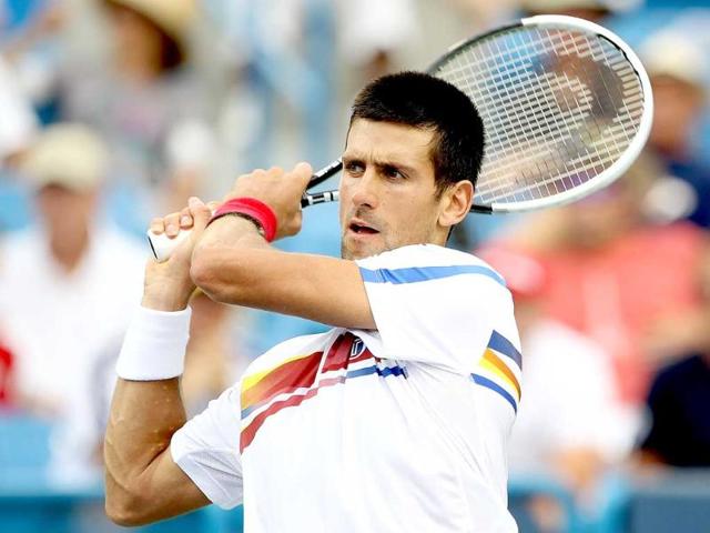 Novak Djokovic of Serbia returns a shot to Radek Stepanek of the Czech Republic during the Western & Southern Open at the Lindner Family Tennis Center in Mason, Ohio.