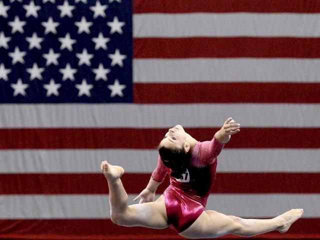 Alexandra Raisman competes on the floor during the Senior Women's competition on day two of the Visa Gymnastics Championships at Xcel Energy Center in St Paul, Minnesota.