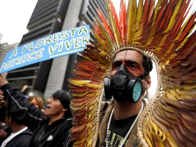 Environmental activists take part during a protest against the construction of the Belo Monte Hydroelectric power plant in the Avenida Paulista in Sao Paulo.