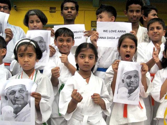 Students of a karate training centre support Anna Hazare's movement in Siliguri.