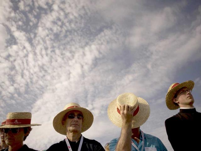 Pilgrims gather for a mass celebrated by Pope Pope Benedict XVI at the Cuatro Vientos air base outside Madrid during the World Youth Day (WYD) festivities.