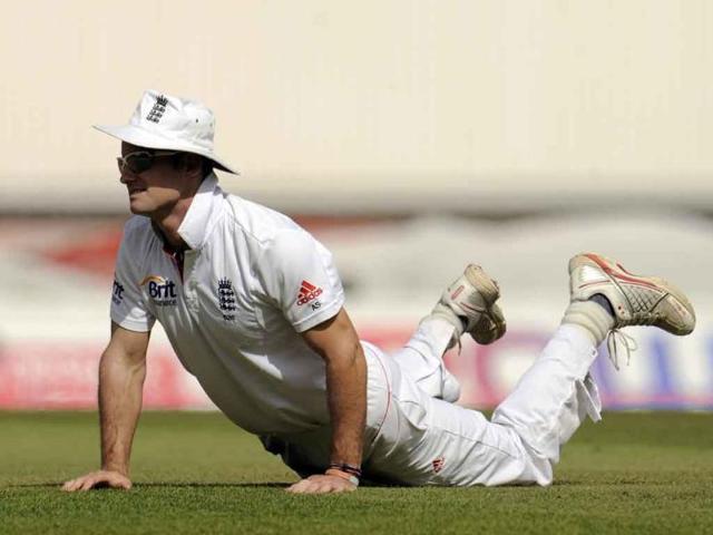 England's captain Andrew Strauss watches the ball from the ground during the fourth Test cricket match against India at the Oval cricket ground in London.