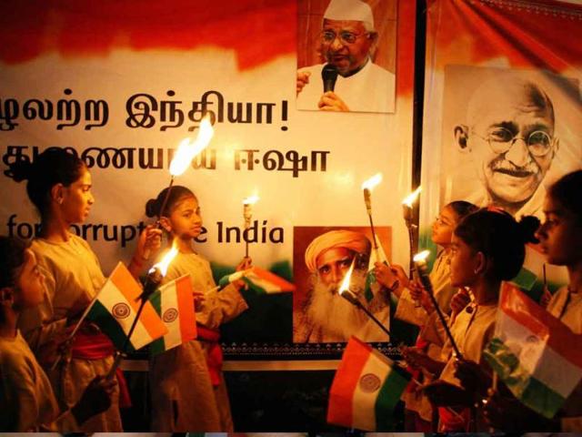Supporters of social activist Anna Hazare take part in a candle light vigil in support of Jan Lokpal Bill in Coimbatore.
