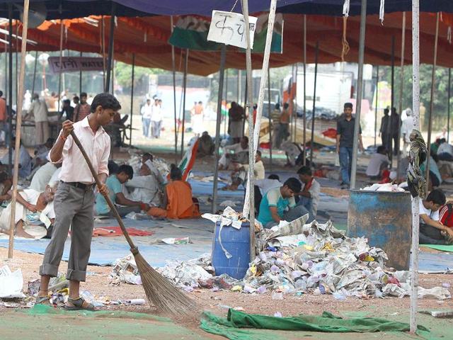 MCD workers clean Ramlila Maidan, the venue of of Anna Hazare's protest against corruption, in New Delhi.