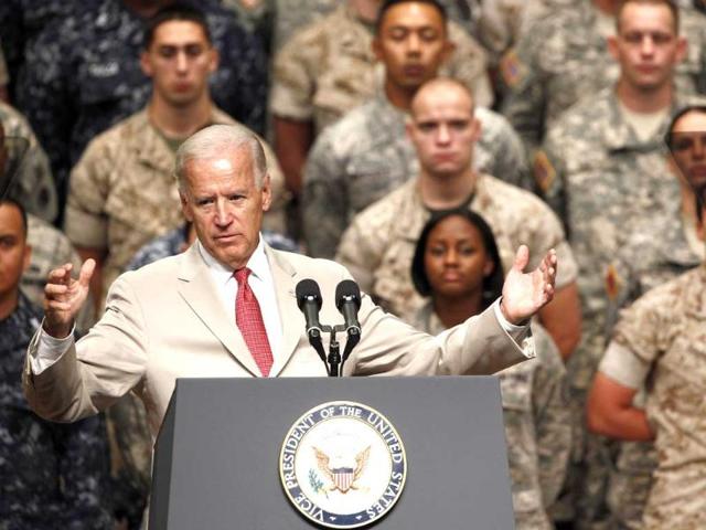 US Vice President Joe Biden gestures as he gives remarks at Yokota Air Base, on Tokyo's outskirts during a visit to Japan.