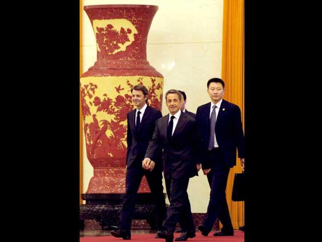 French President Nicolas Sarkozy arrives for a meeting with Chinese President Hu Jintao at the Great Hall of the People in Beijing.