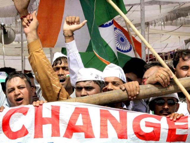 Supporters of anti-corruption activist Anna Hazare shout anti-government slogans on the 10th day of his hunger strike in New Delhi.